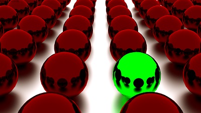 Rows of red spheres with one green sphere